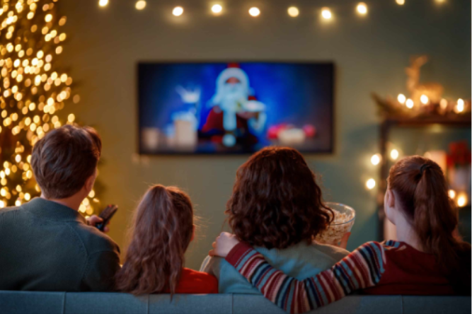Christmas family watching tv